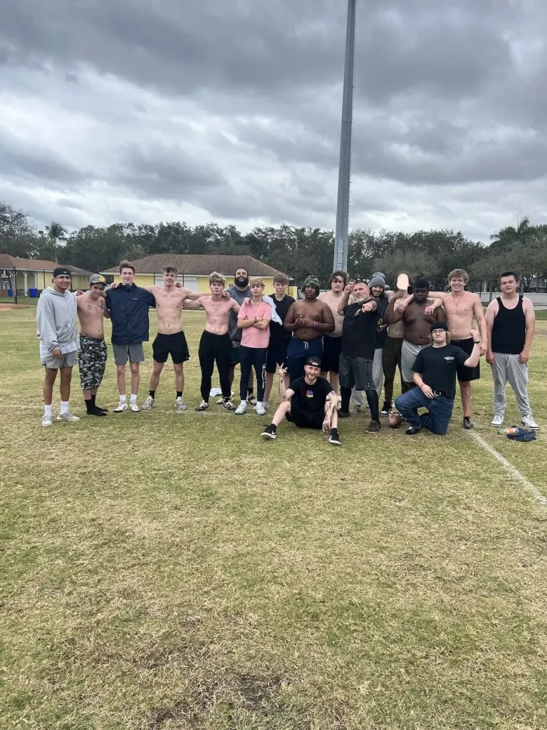 alumni playing sports outside