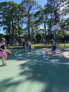 alumni playing basketball