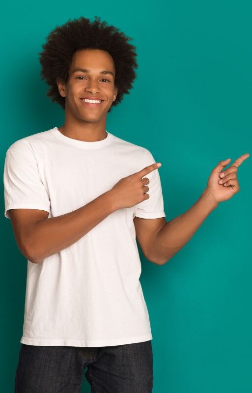 Teen boy pointing to the right