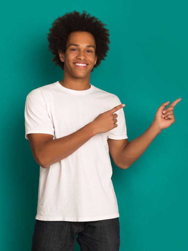 Teen boy pointing to the right